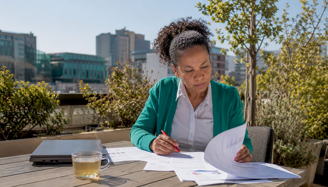 South African HR manager reviewing skills-based hiring documents