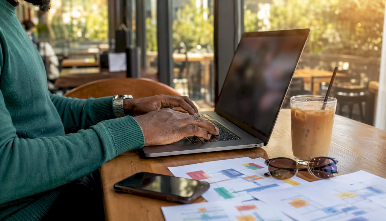 Recruiter managing WhatsApp automation on laptop