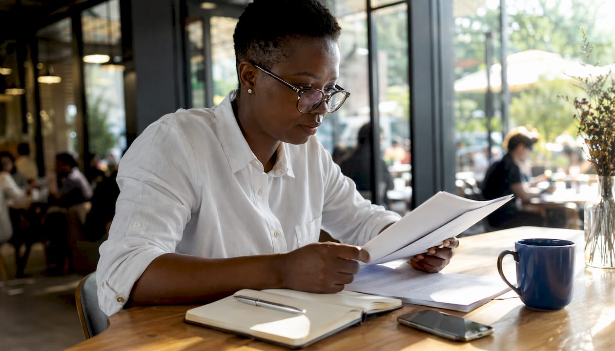 Researcher reviewing South African whistleblower laws