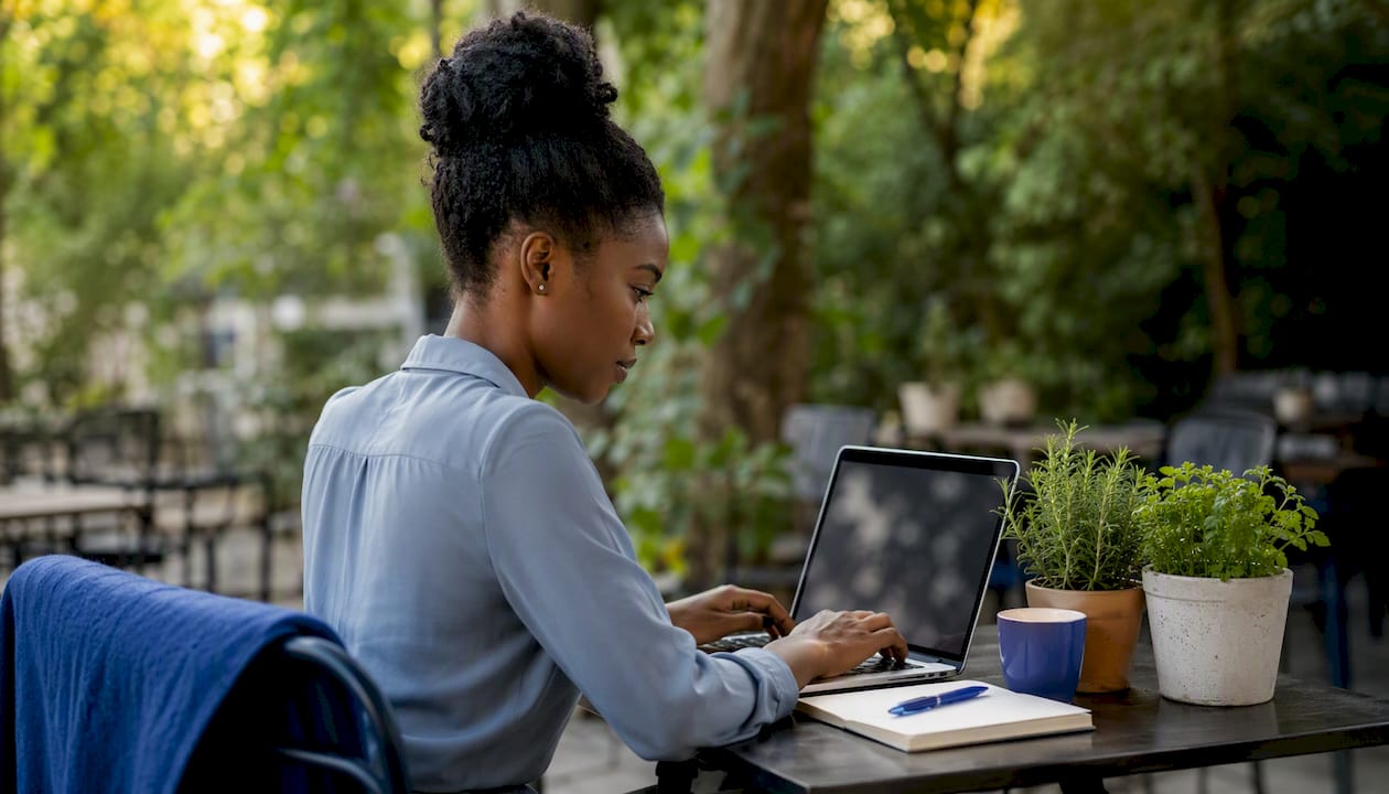 Young South African woman verifying COIDA letter online