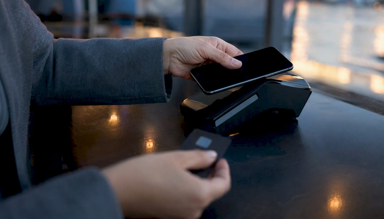 Hand making early credit card payment