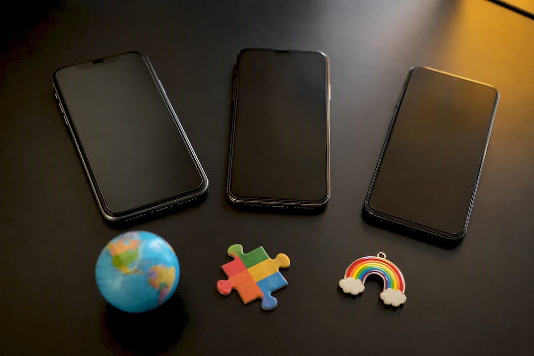 Three phones showing emoji diversity concept