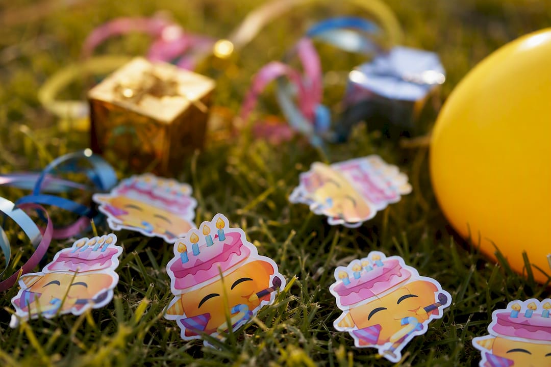 Birthday cake emoji stickers with party props