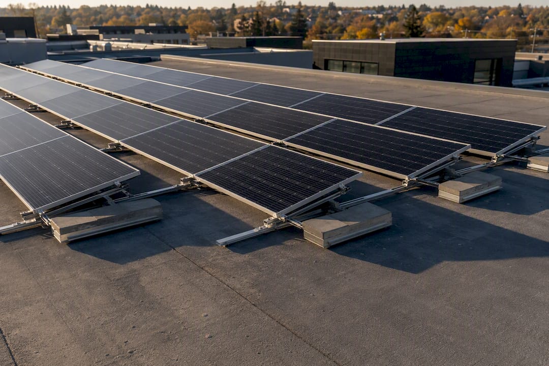 Ballasted solar panel mount on flat roof