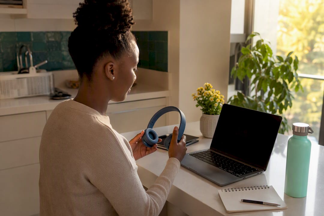 Student preparing bursary application at laptop