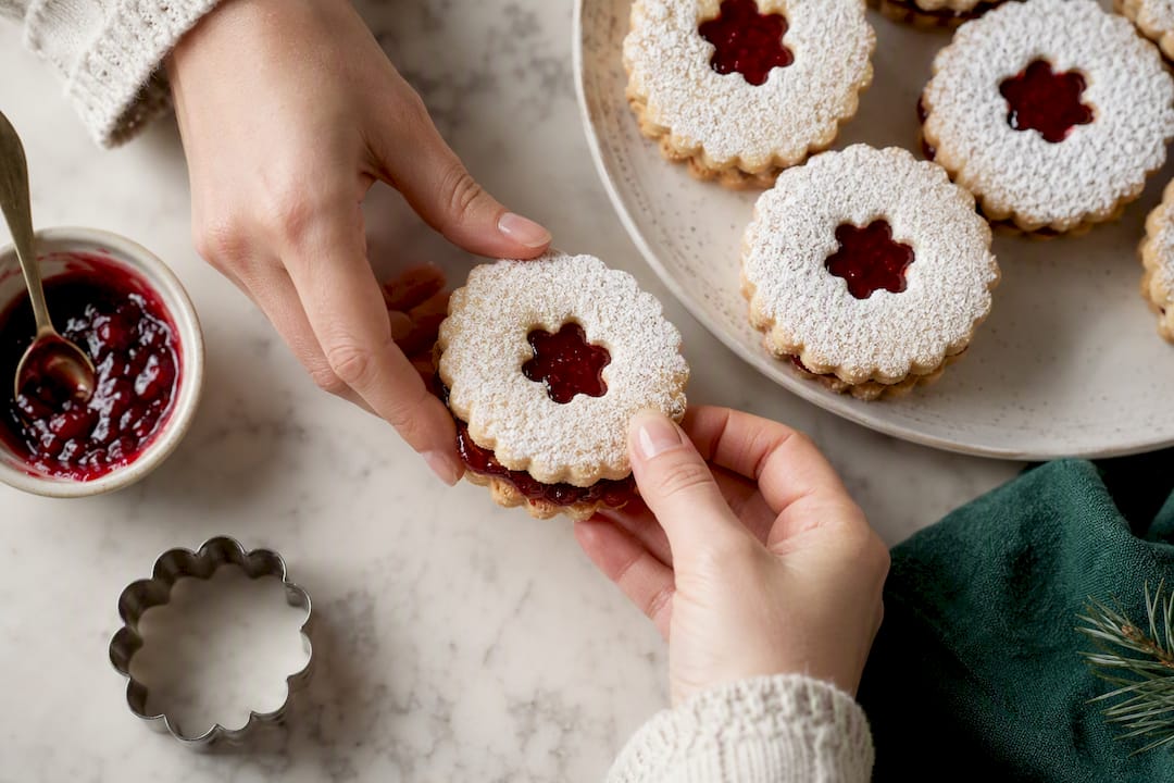 Linzer cookies filled with raspberry jam