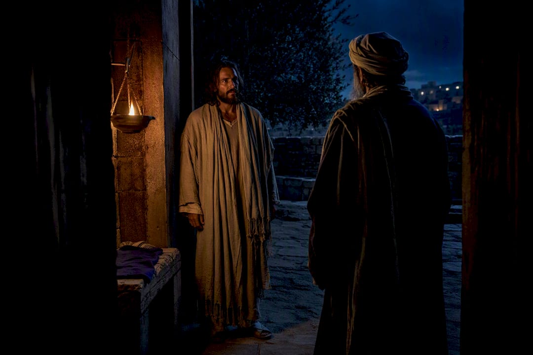 Nighttime conversation representing Nicodemus and Jesus