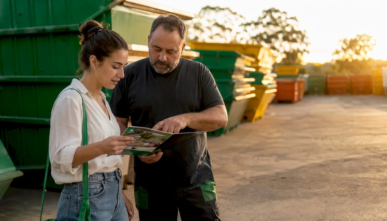 Customer discussing skip bin options at depot