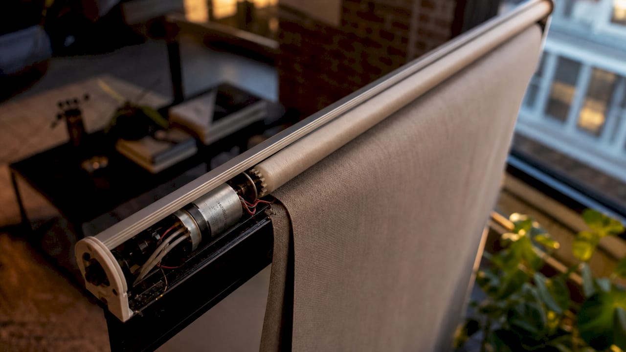 Close-up of motorized roller blind mechanism