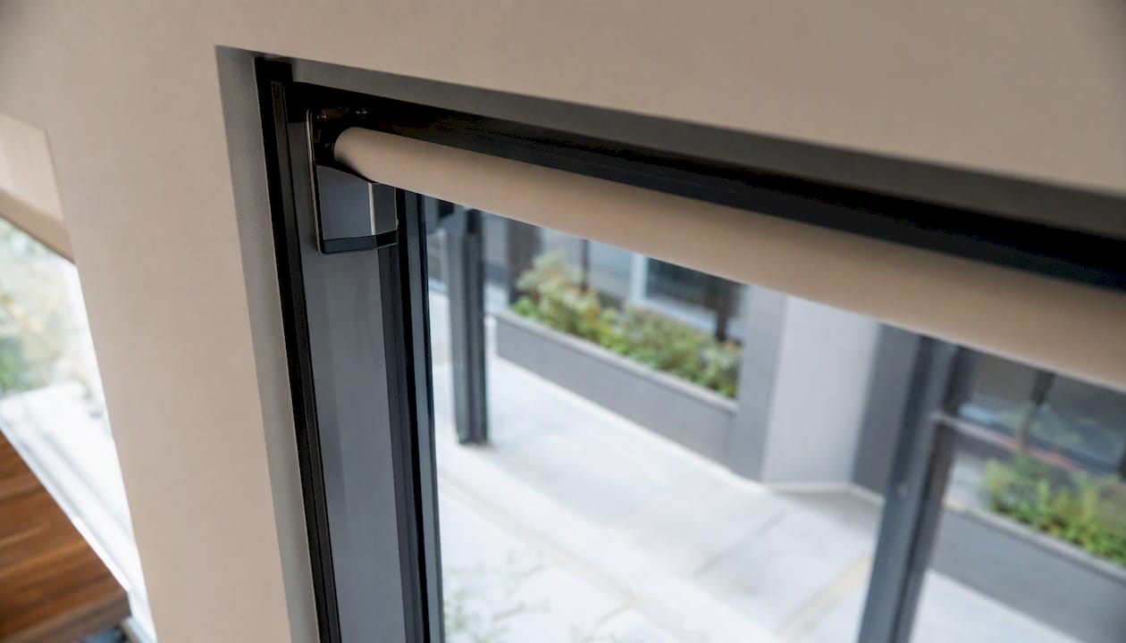 Inside mounted roller shade with hardware detail