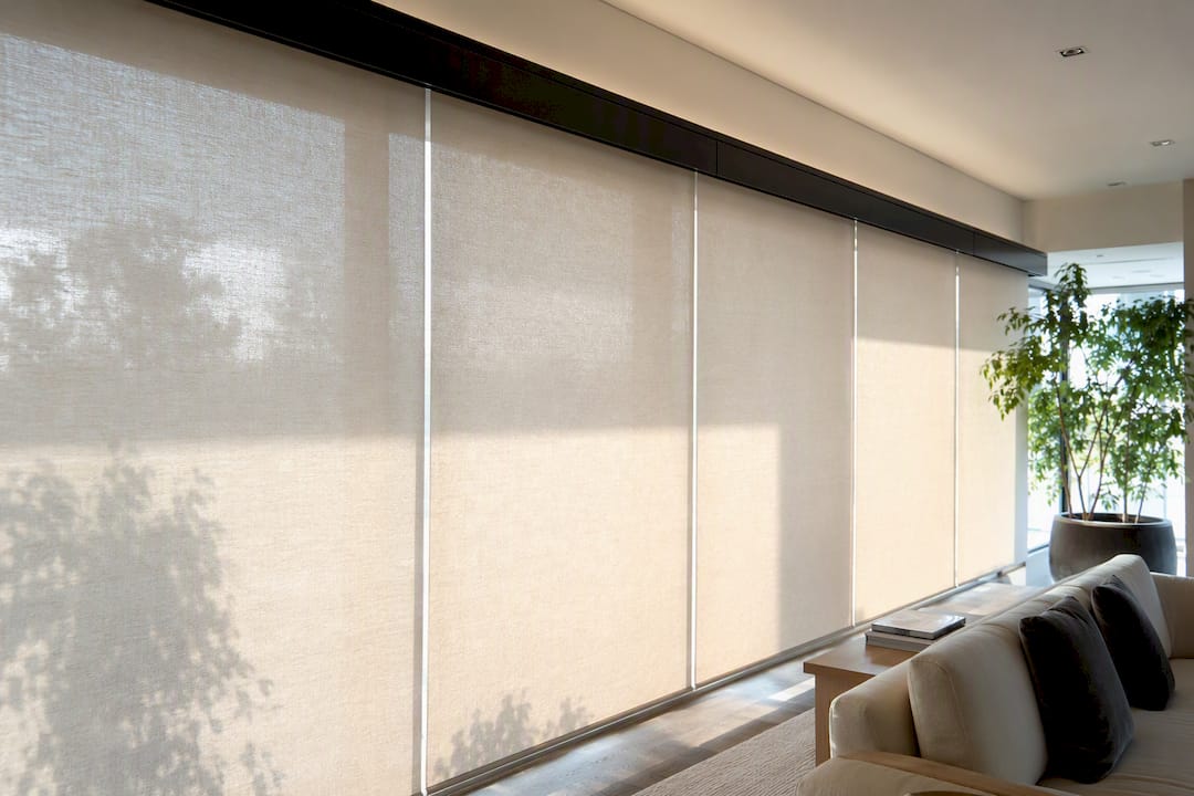 Synced multiple motorized roller shade panels