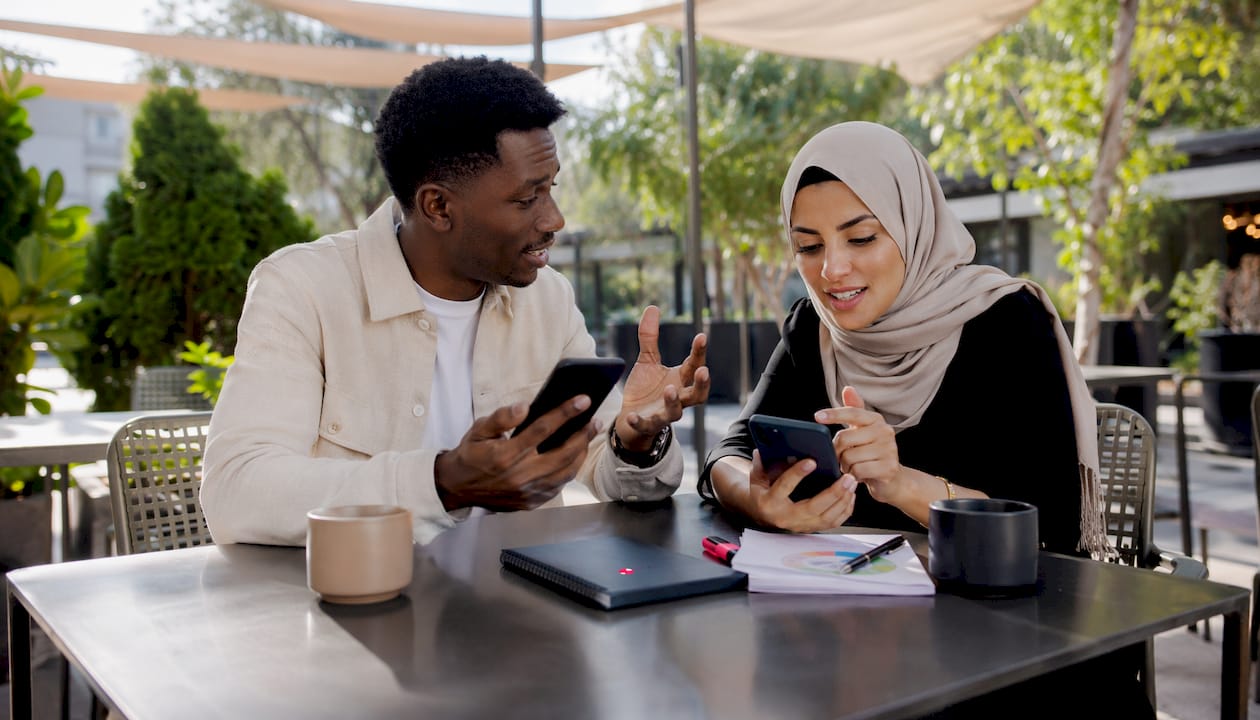 Team collaboratively testing AI-generated ad variants