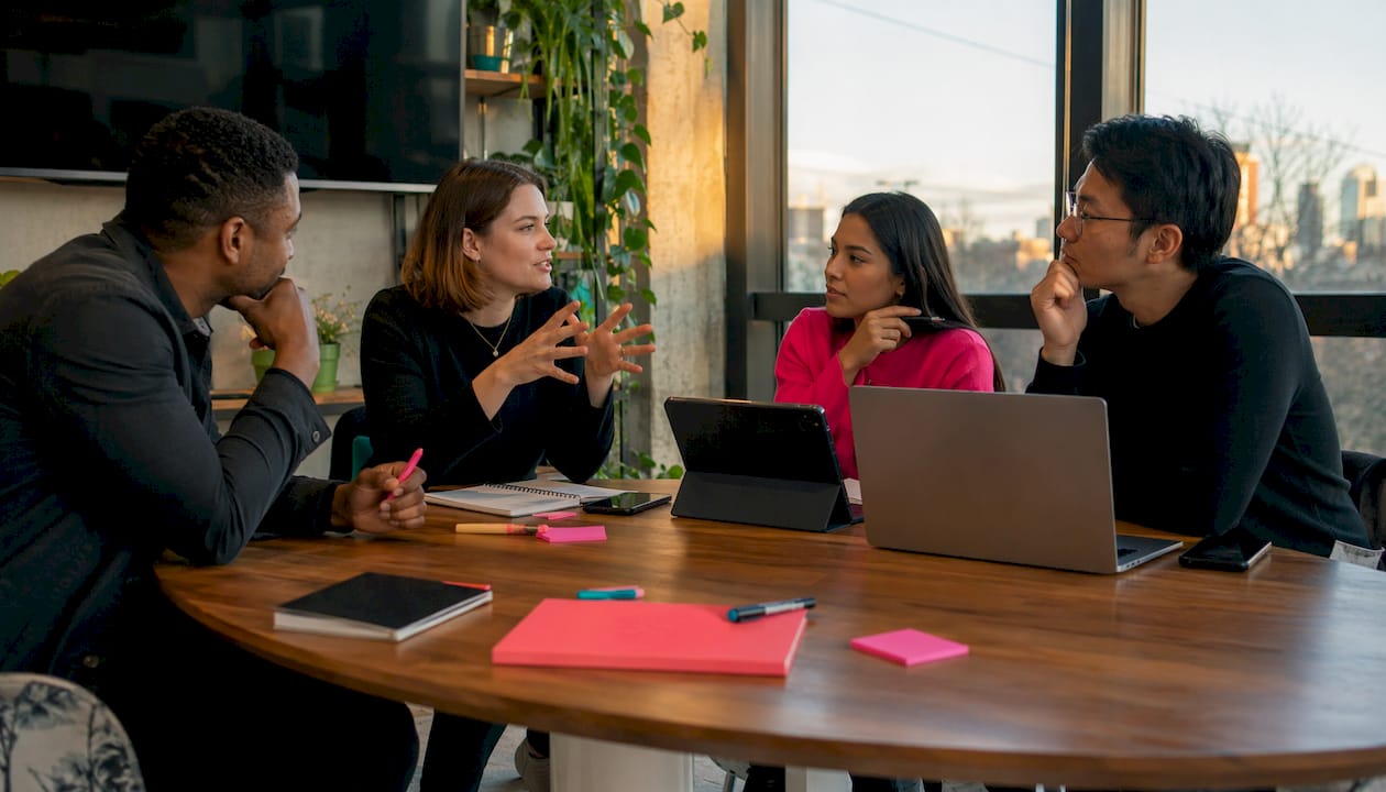 Marketing team discussing AI ads in office