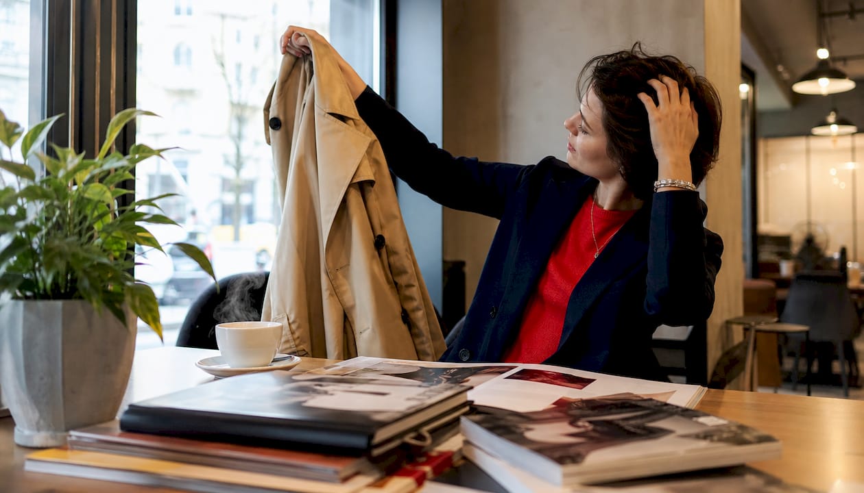 Stylist selecting curated alternative pieces