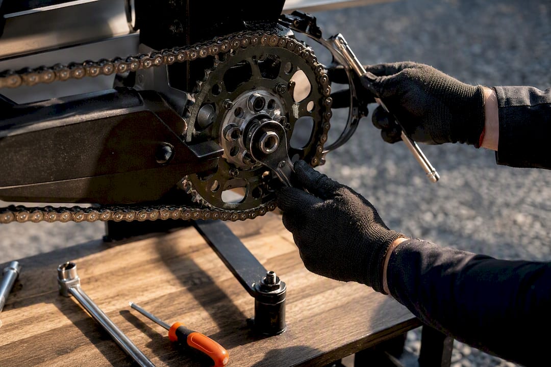 Rider replacing a drivetrain sprocket