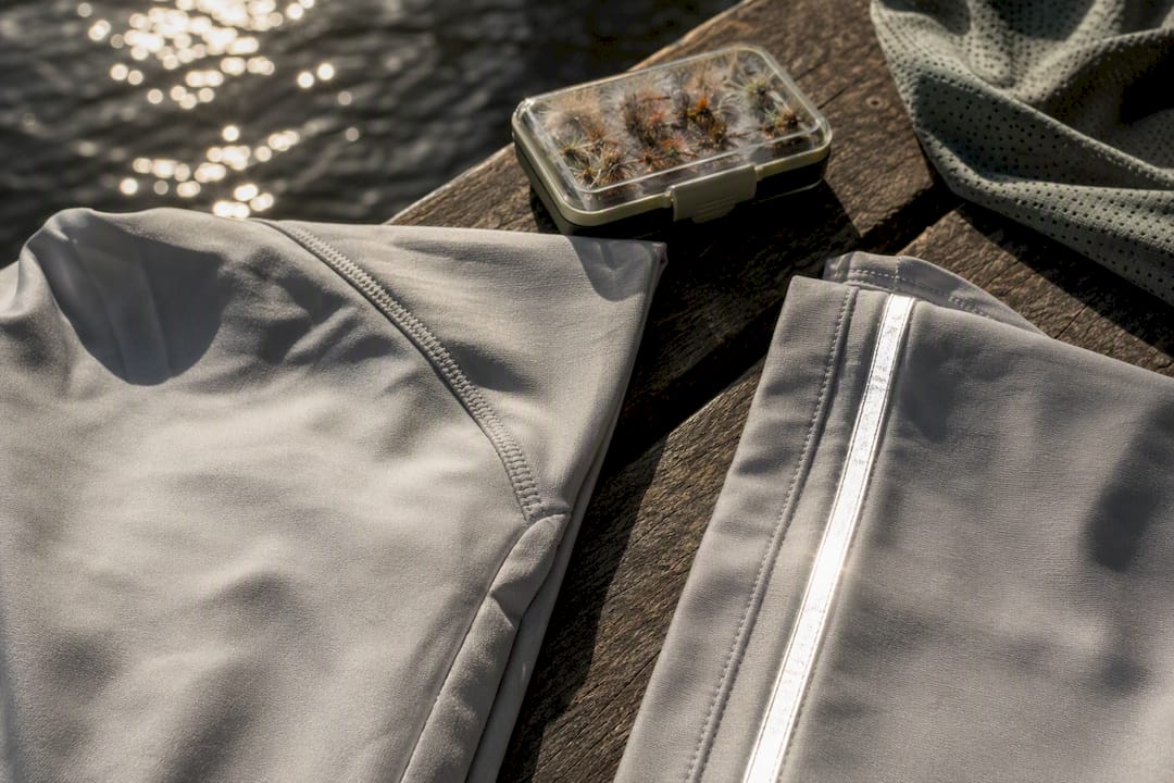 Matte fabric beside reflective fishing trim