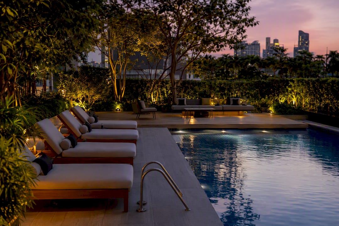 Resort-style pool and garden at Aurea