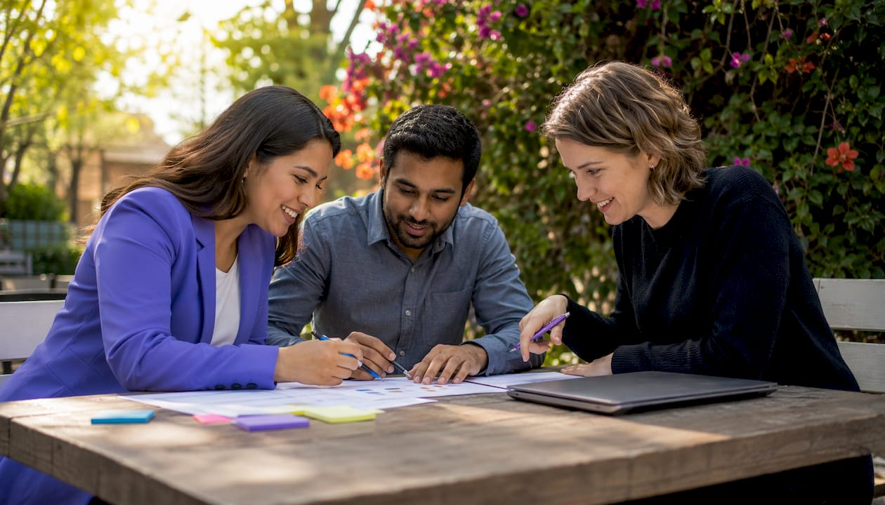 Team discussing AI sales tools in office