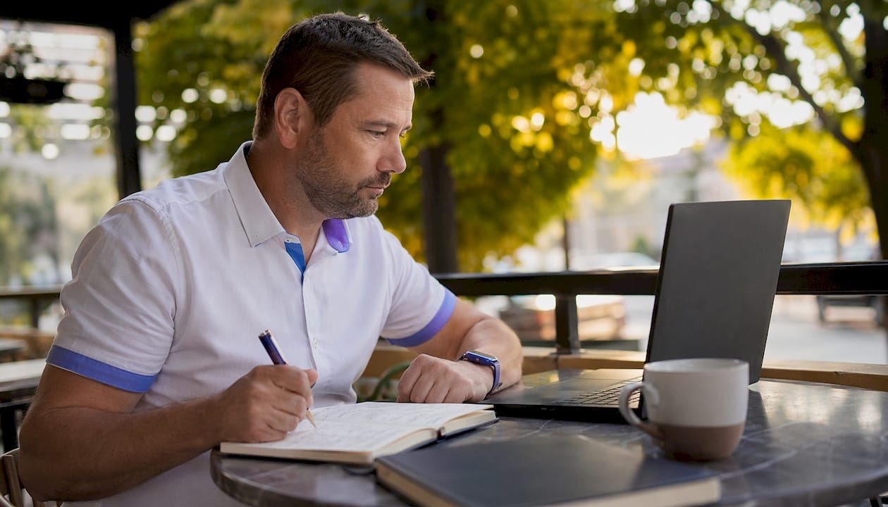 Man preparing Tell-Show-Tell demo notes