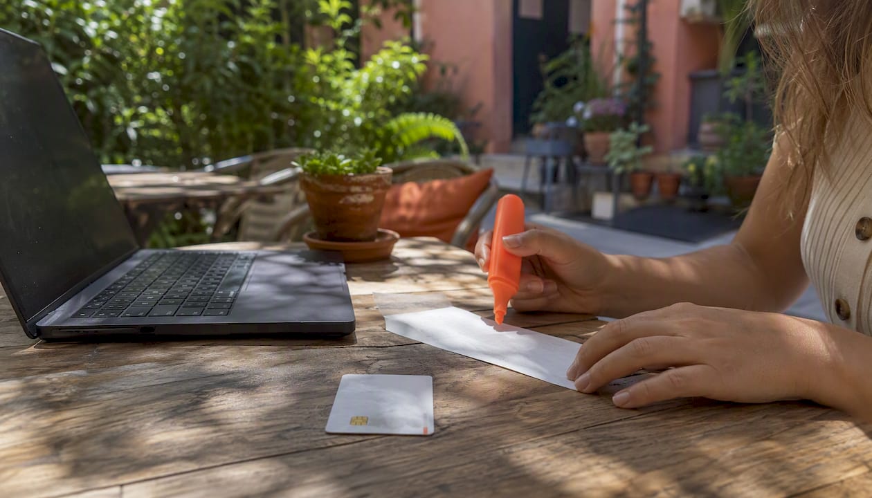 Receipt and bank card on desk for prepaid accommodation proof