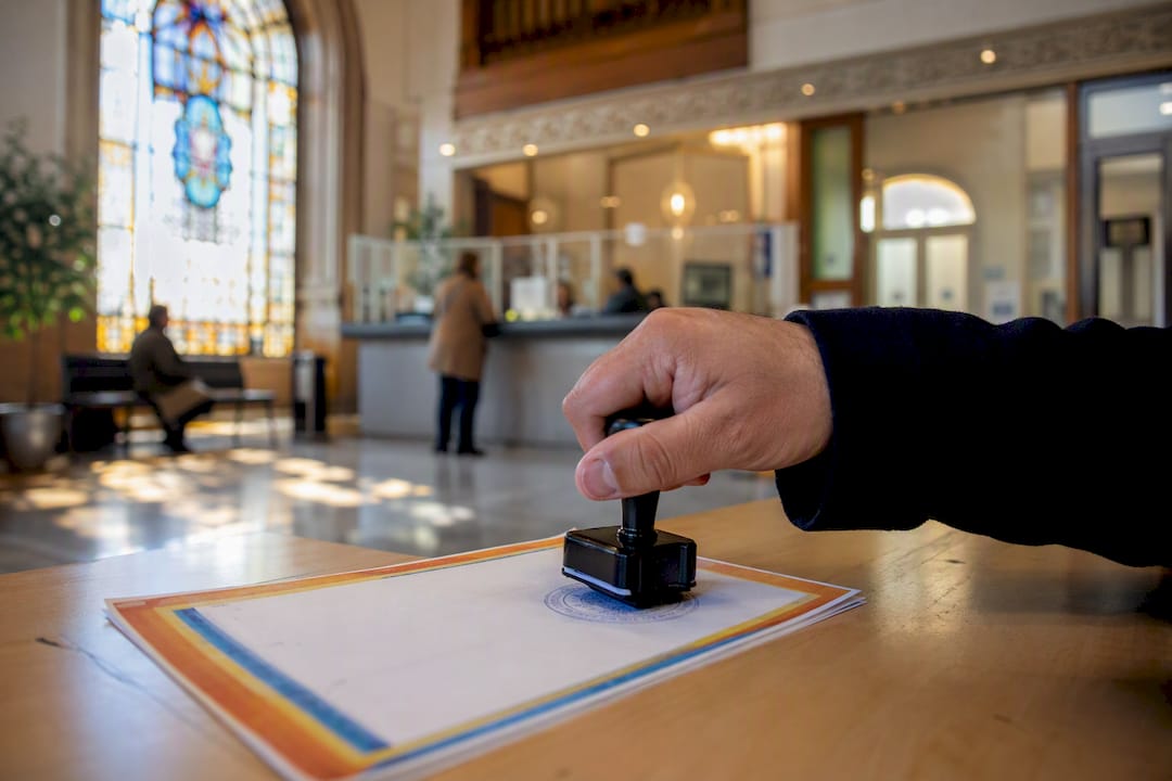 Official empadronamiento certificate being stamped