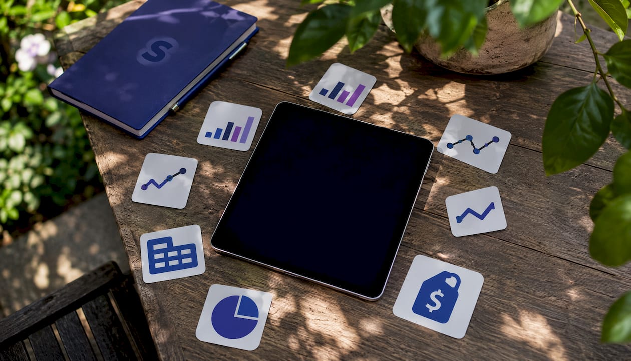 Tablet showing icons for Amazon ad report types