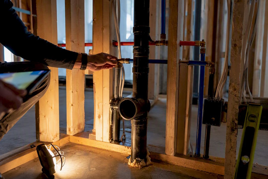 Accessible bathroom plumbing and wiring before drywall