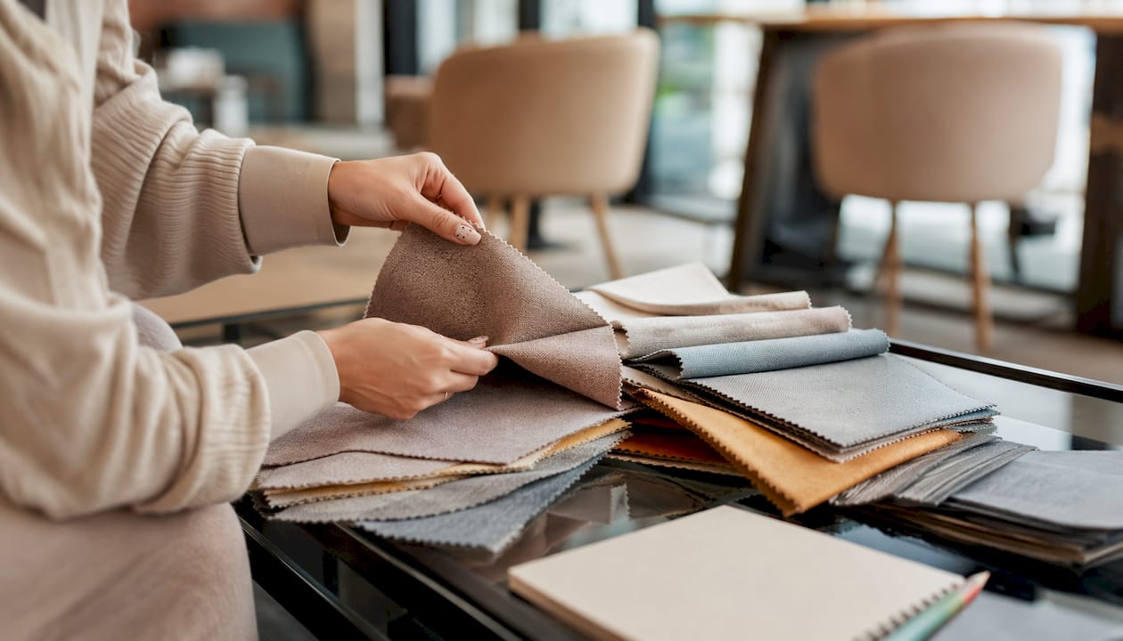 Close-up of polyester curtain fabric swatches on table