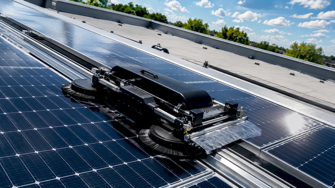 Solar panel cleaning robot on rooftop