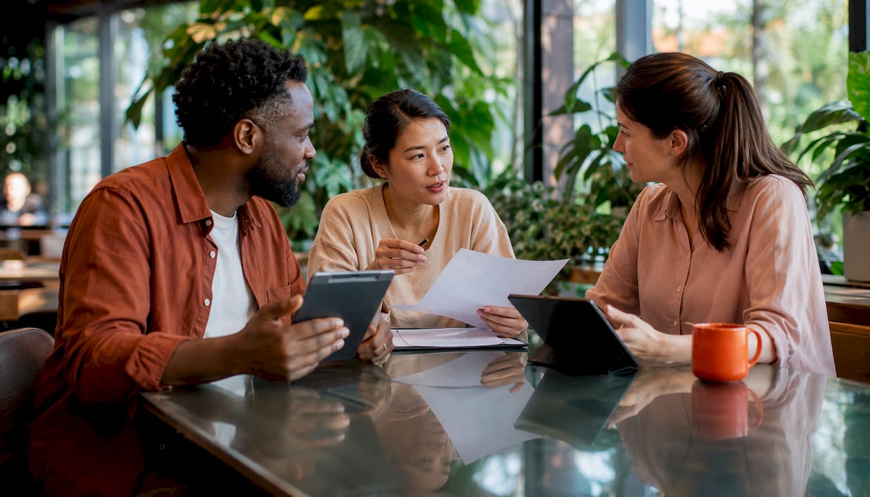 Diverse professionals collaborating on Red Team roles