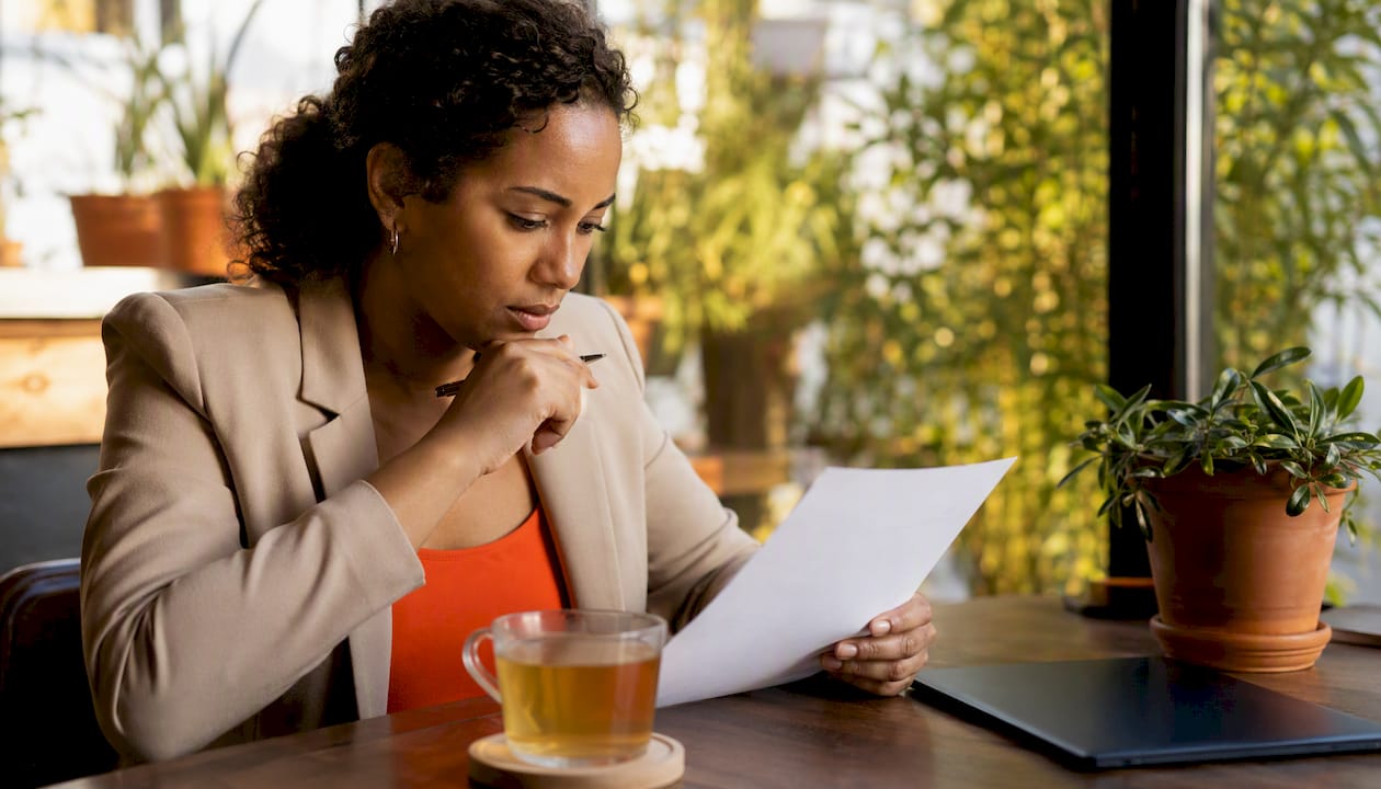 Woman reviewing RFP core elements checklist