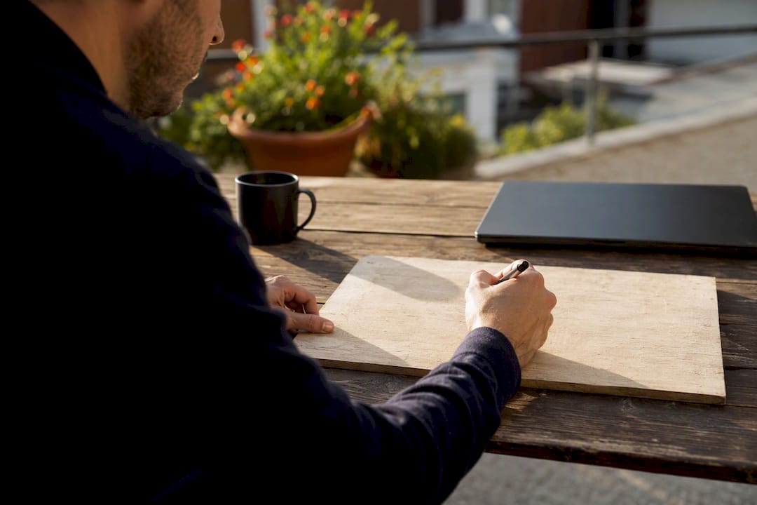 Hiring manager writing a brief on whiteboard