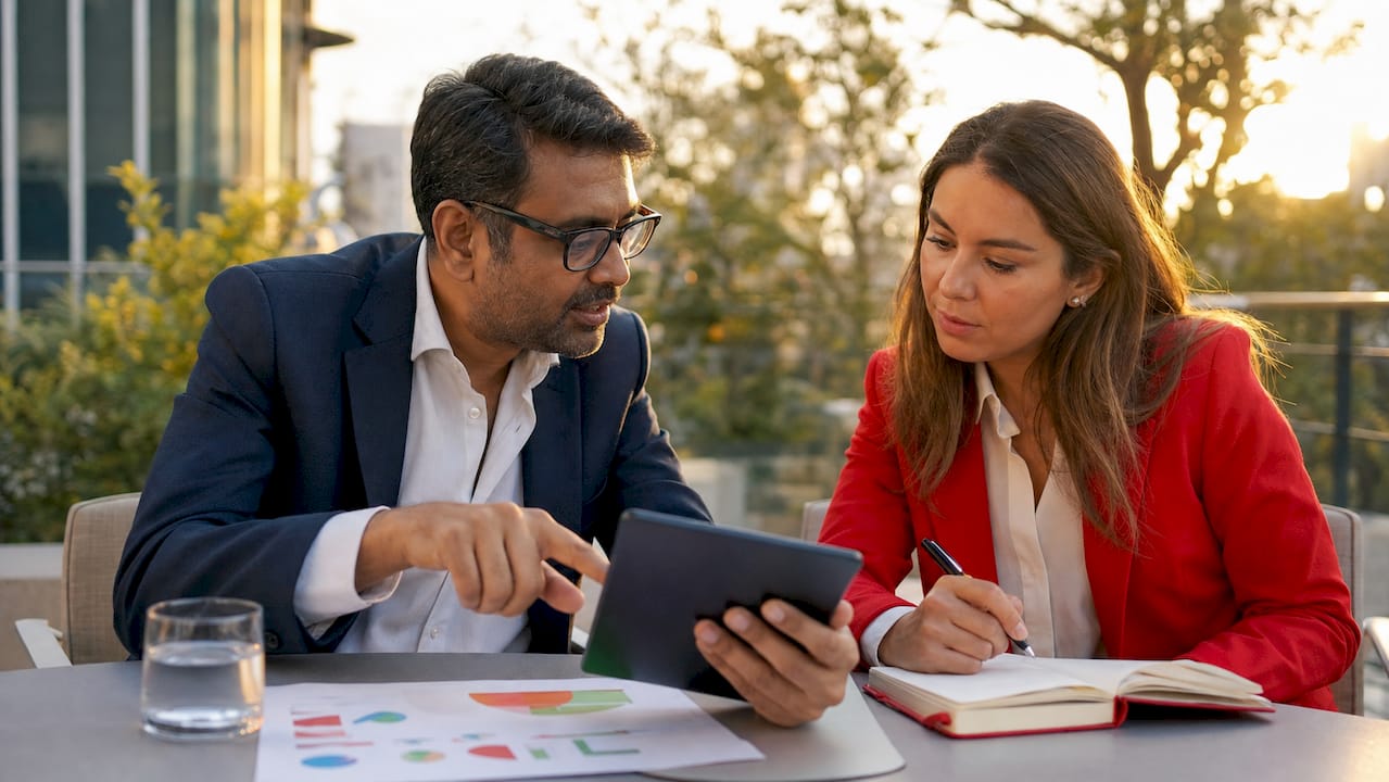Professionals collaborating on customer intelligence data