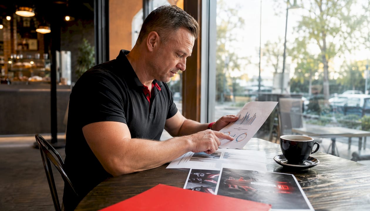 Fitness operator analyzing campaign reports