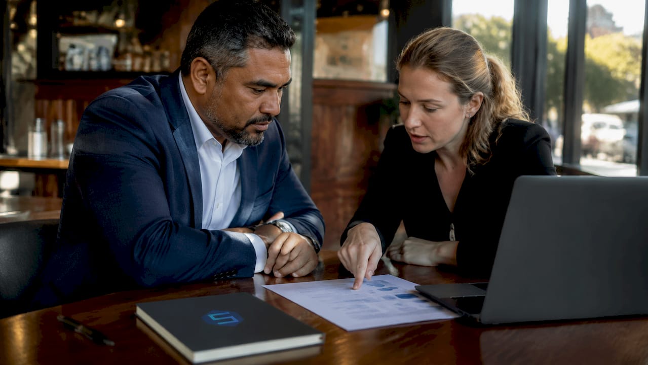 Business professionals discussing IT security