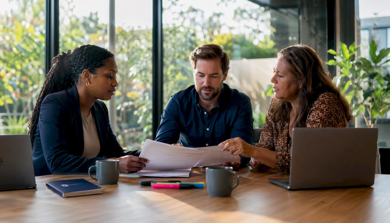 Team conducting cybersecurity risk assessment discussion