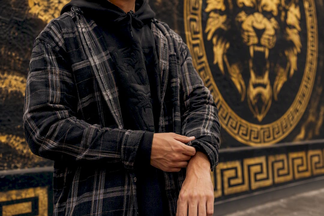Mid-layer hoodie and flannel texture close-up