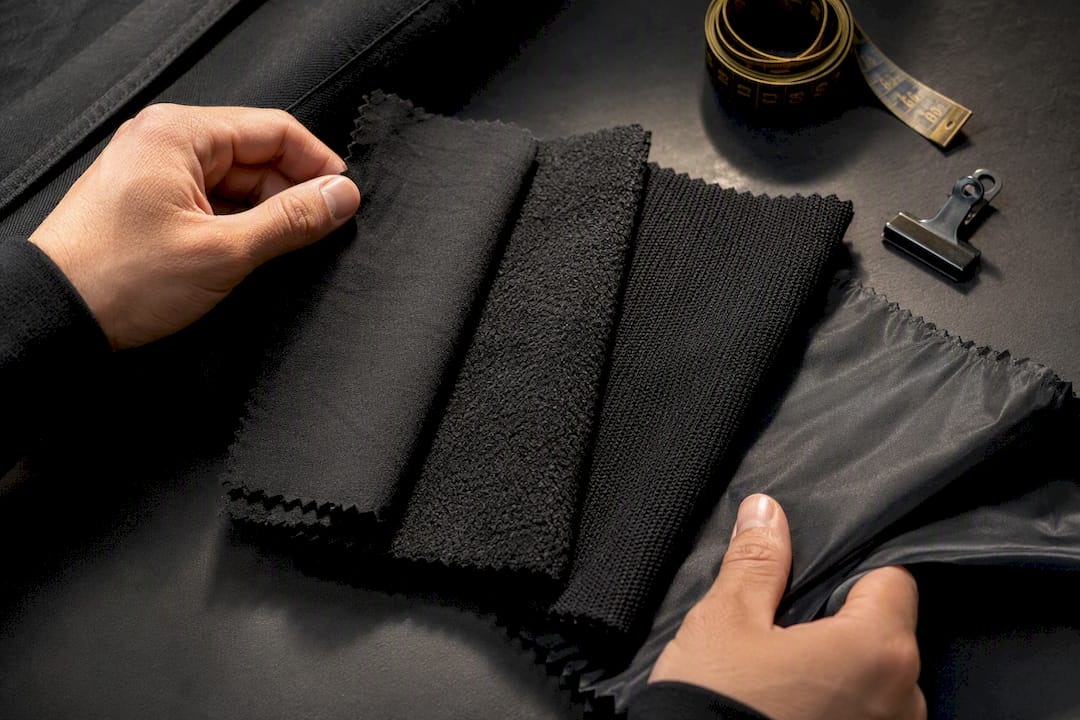 Black fabric swatches showing texture differences