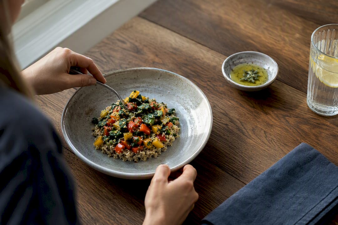Hands preparing low-fermentation fiber meal