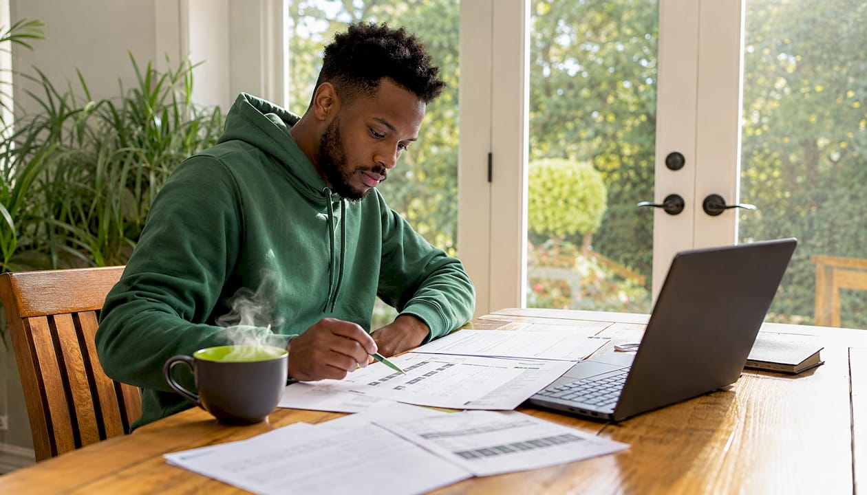 Analyst reviewing AI sports betting data