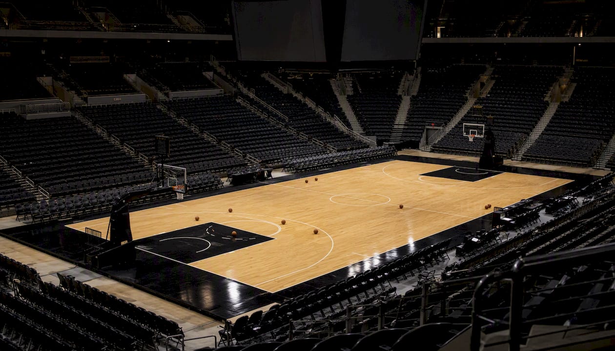 Empty NBA basketball arena court with balls