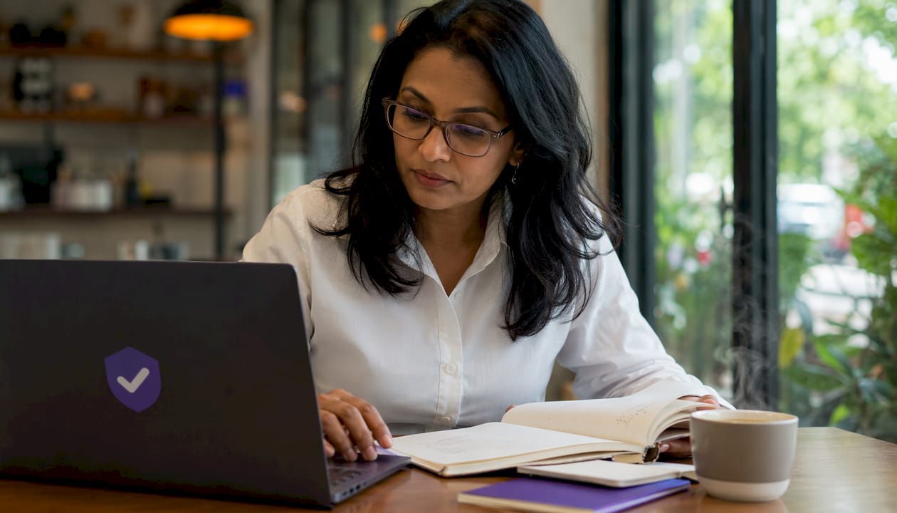 Woman troubleshooting email security on laptop
