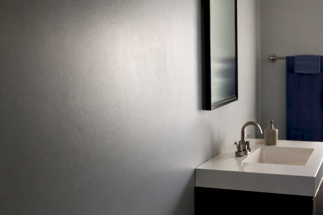 Low-sheen painted bathroom wall surface
