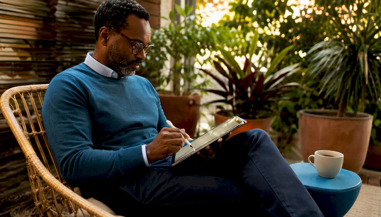 Man reviewing mindset workbook ebook
