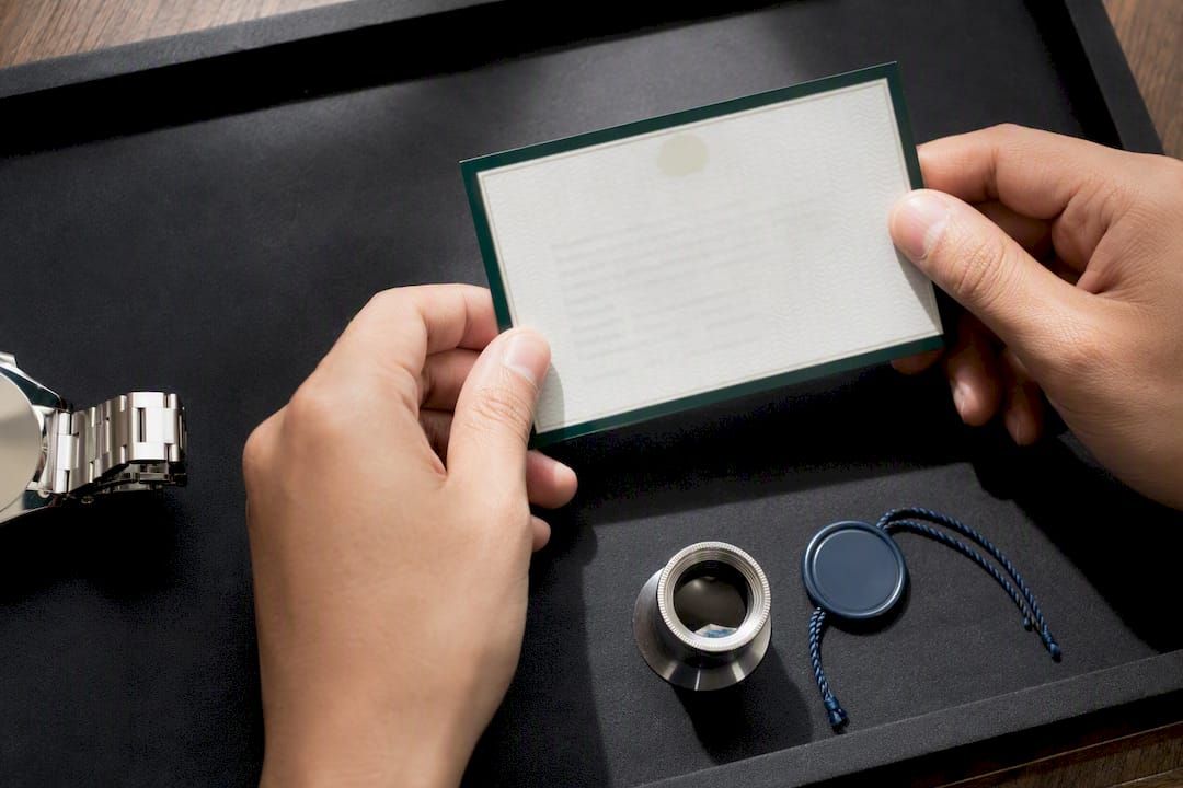 Buyer checking stamped watch warranty card