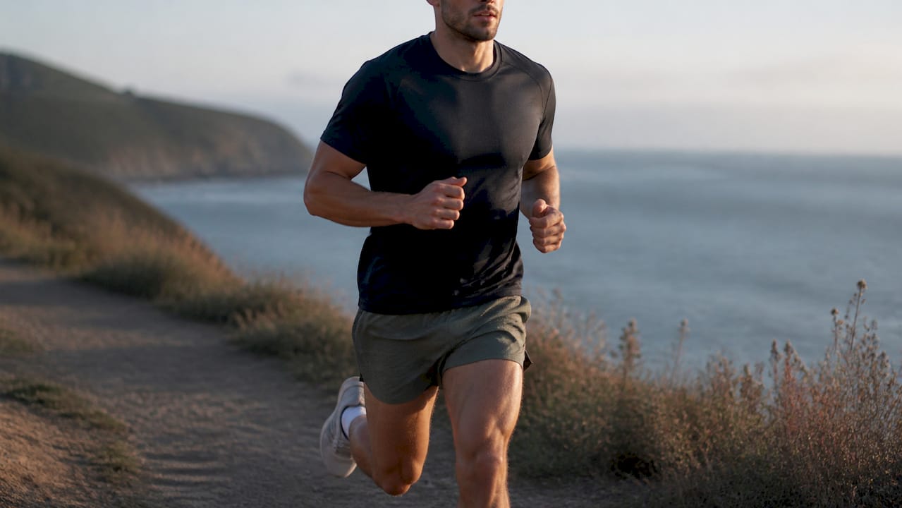 Athlete jogging in unlined mesh running shorts