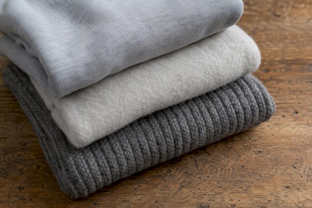Cotton, fleece, and wool knit textures side by side