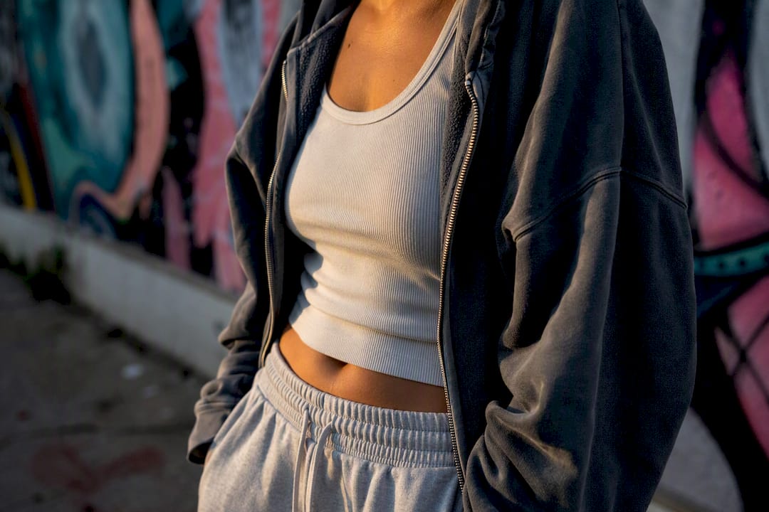 Layered fitted and oversized streetwear contrast close-up