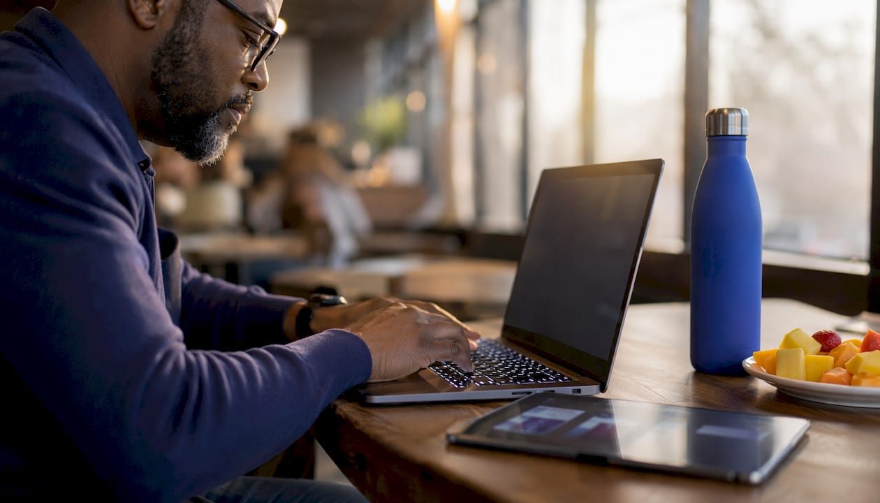 Developer hands typing for e-signing API integration