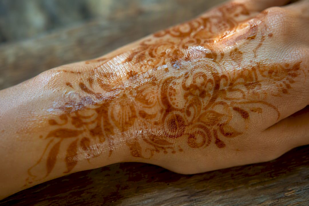 Henna stained skin with oil layer